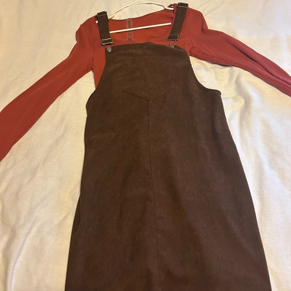 Corduroy brown jumper dress with rust colored long sleeve crop top